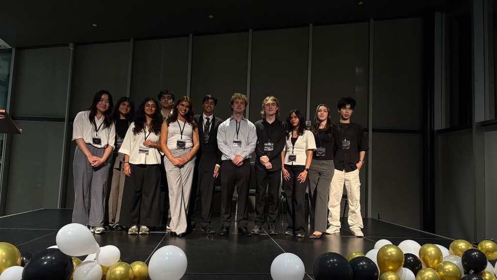 The DEMA 2026–2027 team on stage at The Blind Duck
